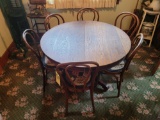 Oak harvest table with 3 leaves and 6 bentwood chairs