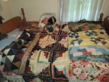 Assorted quilts and comforters
