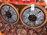 Pair of lead stained-glass windows with fleur de lis centers, 33 inches diameter