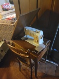 Singer sewing machine with cane bottom chair