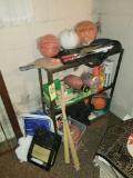 Assorted sport balls and shelf