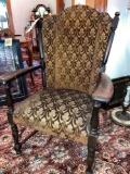 Antique upholstered armchair