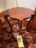 Small side table with floral shaped top