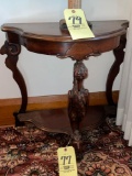 Heavily carved foyer table, Herron and ram front, 24 inches