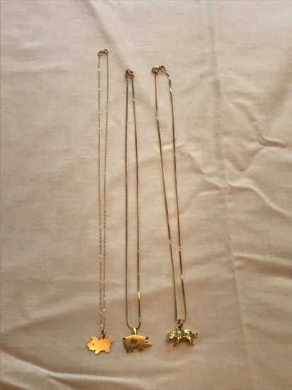 3 14K gold necklaces with 14k pig pendants