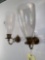 Pair candle sconces, one has dent.