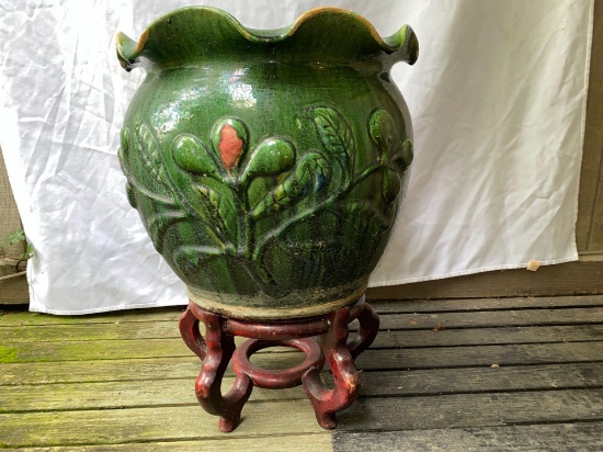 Glazed pottery planter w/ wooden base, 22.5" tall w/ base.