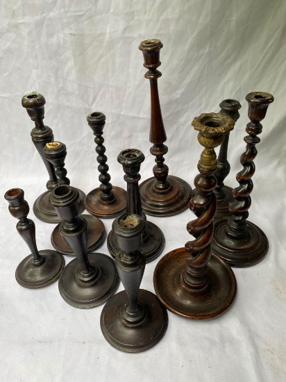 Wooden candle sticks, (11) odd.