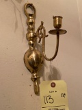 Brass candle sconce.