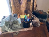 Oriental desk box, books, pincushion doll lamp shade, pens.