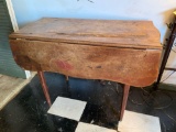 Primitive country style drop leaf table.