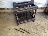 Magazine rack, has (2) spindles missing.