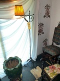 Wrought iron style floor lamp. Top finial broken.