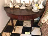 Antique half round wall table.