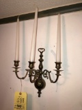 Brass candle sconce.