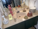 Lamp, milk glass bottles, bowls, pincushion dolls, vases.