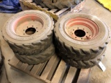 (4) Bobcat S185 10-16.5 Tires with Rims, (3) 10-16.5 Tires