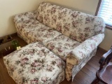 Three cushion floral sofa with ottoman