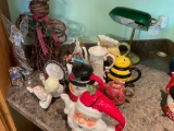 Teapots, figurines and student lamp