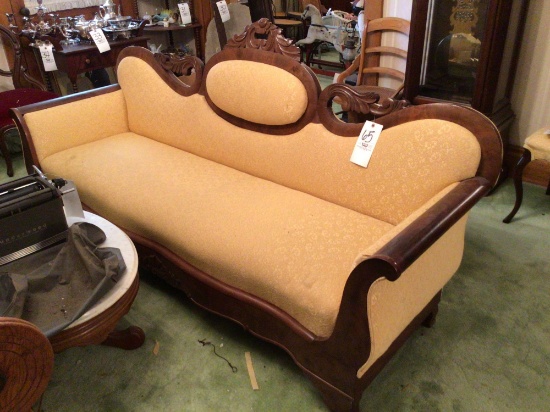 Large carved back sofa