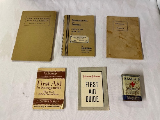 Medical and First Aid books, Band Aid tin advertising.