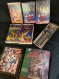 (5) Disney VHS videos, Civil War field guides, card collecting album (no cards)