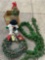 Christmas decor, wreath, snowman, tree w/ lights.