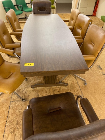 Formica top conference table, 8' long x 3' wide. Chairs not included.