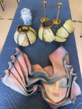 Leather lady face plaque, brass candles, pair slag glass shades (one damaged), jar.