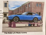 Kwik-Lift w/ owner made custom accessories, 5,000 lb. capacity. Car in picture not included.