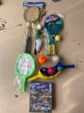 Badminton & yard tennis, lacrosse items, picture puzzle.