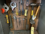 Pipe wrenches. Hammers. Tools.