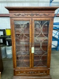 China cabinet. 7ft high. Glass front. Glass shelves.