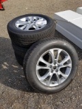Set of 4 mounted Bridgestone 245/60R18 tires, slightly used