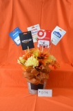 Gift cards glore! The lucky recipient of this item will receive a flower tin with a $25 Amazon card,