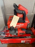 Two Milwaukee tools grinder and light