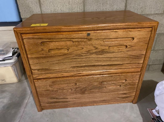 Oak 2-drawer file cabinet, 36" wide x 30" tall.