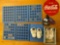 (2) Books w/ (27) Lincoln Memorial cents, Coca Cola patch, (2) pairs baby shoes, timers.