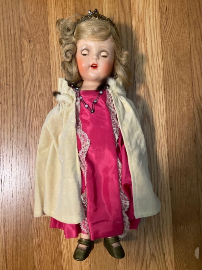 Composition Shirley look alike doll w original dress & cape, 17" tall.