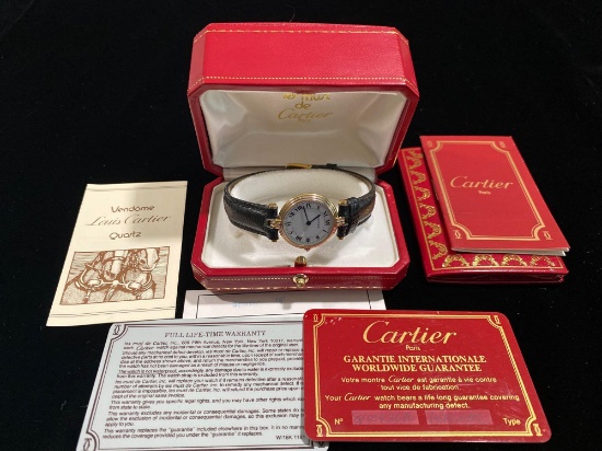 Louis Cartier Vendome quartz watch w/ warranty certificates.