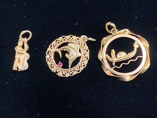 (3) 14K gold charms, 5.6 grams.