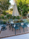 Patio table w/ (6) chairs, umbrella & holder.