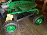 John Deere gardening seat on wheels.