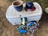 Ice chest , Indians batting helm pottery planter.