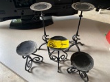 Wrought iron style candle holders.