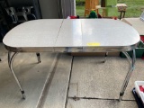 Chrome leg kitchen table.