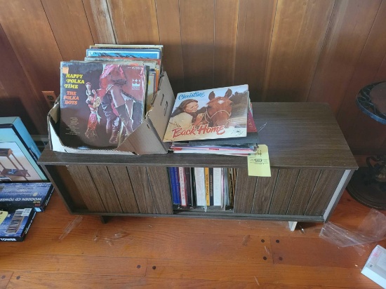 Record cabinet with various records