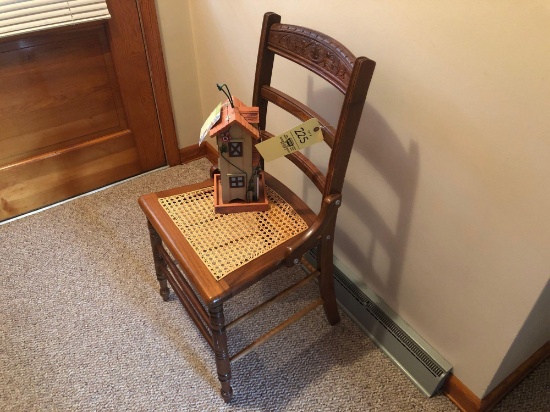 Antique chair, bird house, wall decorations