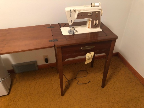 Singer sewing machine with cabinet
