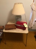 Card table, lamp, luggage